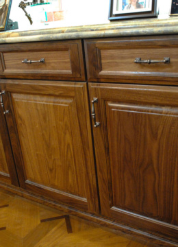 solid wood walnut cabinets with marble counter